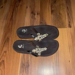 Yellow box flip flops